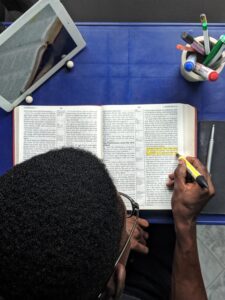 Man highlight bible verses